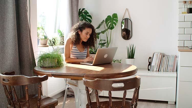 Woman on laptop in office